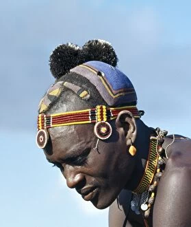 Jewellery Collection: A Turkana man with a fine clay hairstyle