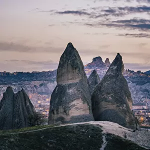 Turkey, Central Anatolia, Cappadocia. Rose Valley with fairy chimney on foreground