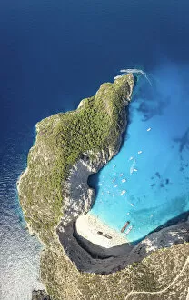 Images Dated 22nd April 2022: Turquoise lagoon surrounding the famous Shipwreck Beach (Navagio Beach) from above, aerial view