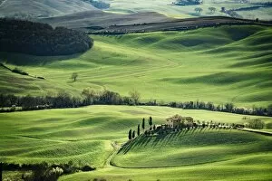 Tuscany, spring landscape, rolling hills at sunset, Val d Orcia, Italy