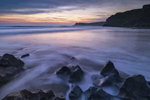 Images Dated 8th December 2021: Twilight over Mewslade Bay on the Gower Peninsula, South Wales, UK