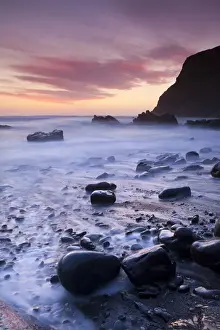 Rocky Beach Prints: Twilight on the rocky beach at Duckpool on the North Cornish Coastline, Cornwall, England