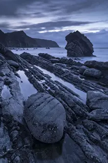 Mouthmill Prints: Twilight over the rocky shores of Mouthmill Beach on the North Devon coast, England