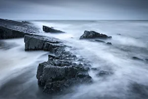 Twilight on the rocky shores of Speke's Mill Mouth, on the North Devon coast, England Twilight on the rocky shores of Speke's Mill Mouth, on the North Devon coast, England