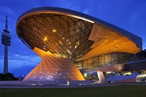 Twilight view of the main entrance to BMW Welt (BMW World), a multi-functional customer experience