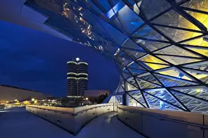 Munchen Prints: Twilight view of the pedestrian bridge link to the BMW Headquarters Office building