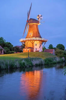 Images Dated 21st June 2023: Twinmills of Greetsiel at dusk, Krummhorn, East Frisia, Lower Saxony, Germany