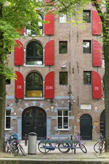 Bicycle Gallery: Typical housing along canals, Amsterdam, Netherlands