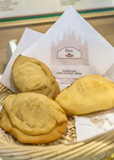 Italian Food Prints: The typical milanese homemade Panzerotti at the old Luini bakery an icon of Milan