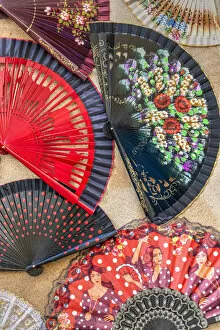 Images Dated 10th April 2019: Typical Spanish folding hand fan for sale in a tourist shop, Arcos de la Frontera