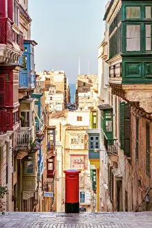 Valletta Prints: Typical Street Scene in the heart of Valletta Red British Mail Box, Valletta, Malta