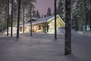 Typical wood chalet of Finland during night, Kittila, Lapland, Finland