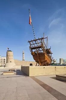 UAE, Dubai, Bur Dubai, Dubai Museum, exterior with traditional Dhow ship