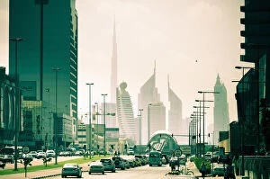Images Dated 5th May 2011: UAE, Dubai, Trade Centre Road, Burj Khalifa and Emirates Towers with Al Karama Metro