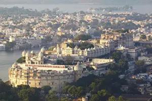 Rajput Architecture Prints: The Udaipur City Palace (Raj Mahal) on Lake Pichola at sunset, Udaipur, Rajasthan, India
