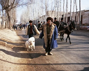 Busy Prints: Uighur man with sheep on the road to Kashgar market