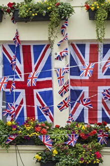 Celebrate Collection: UK, England, London, Kensington, The Churchill Arms Pub with Union Jack bunting to