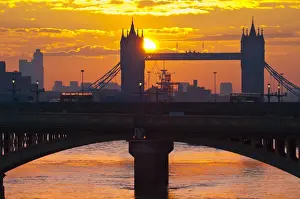 UK, England, London, Southwark Bridge and Tower Bridge at sunrise