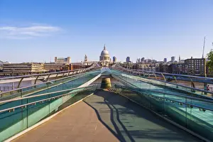 UK, England, London, St. Pauls Cathedral and Millennium Bridge over River Thames
