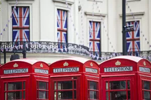 Images Dated 30th August 2012: UK, England, London, The Strand, Red telephone box and Union Jack bunting to celebrate