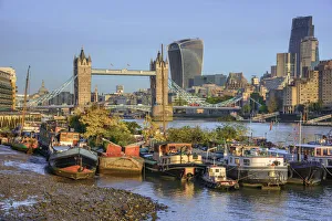 UK, England, London, Tower Bridge over River Thames, City of London skyline