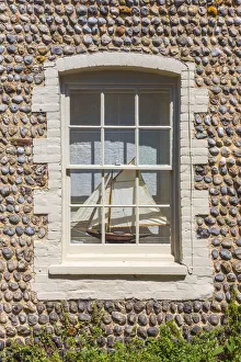 UK, England, Norfolk, North Norfolk, Blakeney, Model Boat in Window