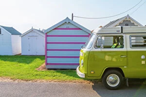 Images Dated 25th July 2023: UK, England, Suffolk, Felixstowe, Beach Huts and VW T2 Baywindow Campervan