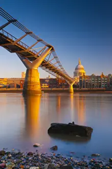 UK, London, St. Pauls Cathedral and Millennium Bridge over River Thames
