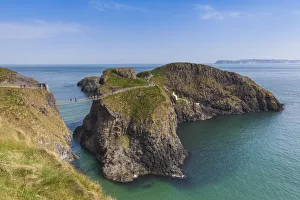Bushmills Prints: UK, Northern Ireland, County Antrim, Ballintoy, Carrick-a-Rede Rope Bridge, elevated view