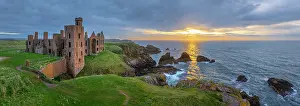 North Sea Prints: UK, Scotland, Aberdeenshire, Cruden Bay, Slains Castle at sunrise