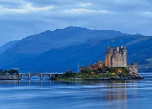 Images Dated 25th January 2017: UK, Scotland, Highlands, Dornie, Twilight view of the Eilean Donan Castle