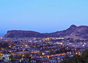 Images Dated 30th March 2016: UK, Scotland, Lothian, Edinburgh, Twilight view of the city with Salisbury Crags