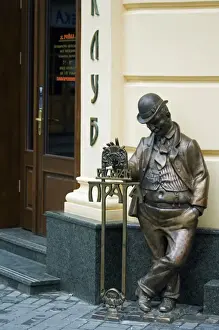 Ukraine Lviv Old Town Unesco World Heritage Bronze Statue outside Cafe