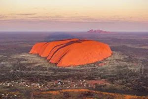 Uluru and Kata Tjuta at sunrise, Aerial view. Northern Territory, Australia
