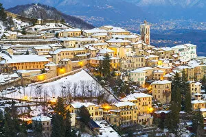 Images Dated 10th April 2015: The Unesco heritage holy mount (sacromonte) of Varese covered with snow at dusk, Varese