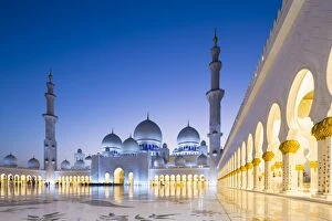 Minarets Collection: United Arab Emirates, Abu Dhabi. The courtyard and white marble exterior of Sheikh