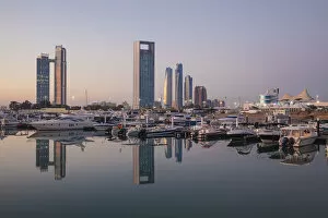 Images Dated 8th May 2014: United Arab Emirates, Abu Dhabi, View of Marina and City skyline looking towards St