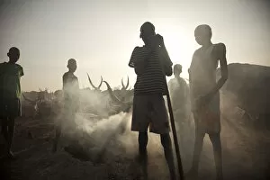 Dust Gallery: Unity State, South Sudan. A cattle camp at dawn near Leer