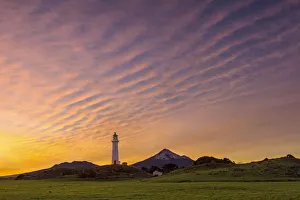 Unusual cloud formations at sunrise, from Cape Egmont lighthouse, Taranaki, New Zealand Unusual cloud formations at sunrise, from Cape Egmont lighthouse, Taranaki, New Zealand