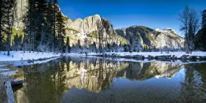 Upper Yosemite Falls Reflecting in Merced River in Winter, Yosemite National Park, California, USA