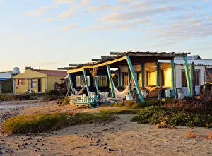Uruguay, Rocha Department, Cabo Polonio, Bungalow on the beach at sunrise