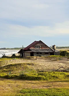 Uruguay, Rocha Department, Punta del Diablo, Houses near la Viuda Beach
