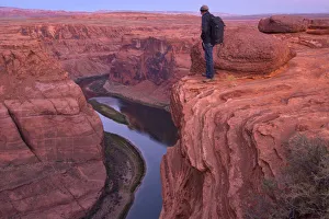 Horseshoe Bend Prints: USA, Arizona, Colorado Plateau, Glen Canyon National Recreation Area, Man with backpack
