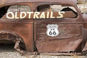Rust Prints: USA, Arizona, Oatman, Route 66, old car rusting away by the side of the road