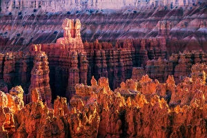 Utah Collection: USA, Bryce Canyon, sun rising thorugh the rock formations
