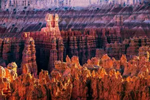 Icon Prints: USA, Bryce Canyon, sun rising thorugh the rock formations