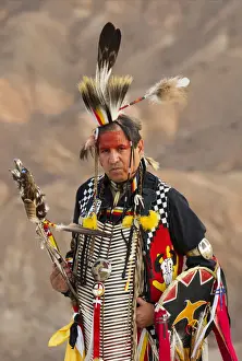 USA, California, Lakota indian Jim Yellowhawk standin in full regalia at Zabriskie