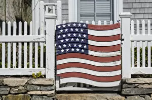 USA, Connecticut, Stonington, gate with US flag