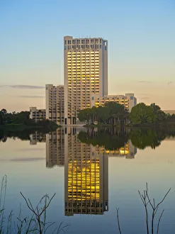 Usa, Florida, Orlando, Skyscraper at sunrise