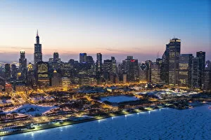 High Gallery: USA, Illinois, Chicago. Aerial dusk view of the city and Millennium Park in winter